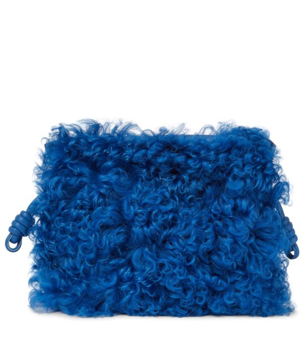Flamenco shearling and leather clutch