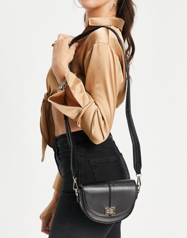 Forever New Anna cross body saddle bag with gold hardware in black