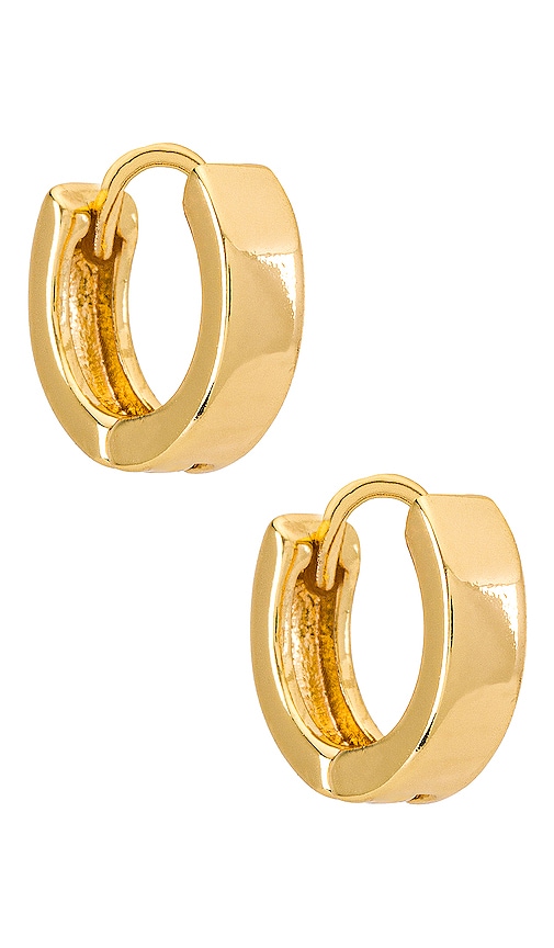 Natalie B Jewelry Marga Huggy Hoop Earring in Metallic Gold.