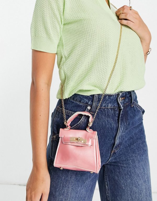 Truffle Collection micro mini top handle satchel bag with gold chain in pink